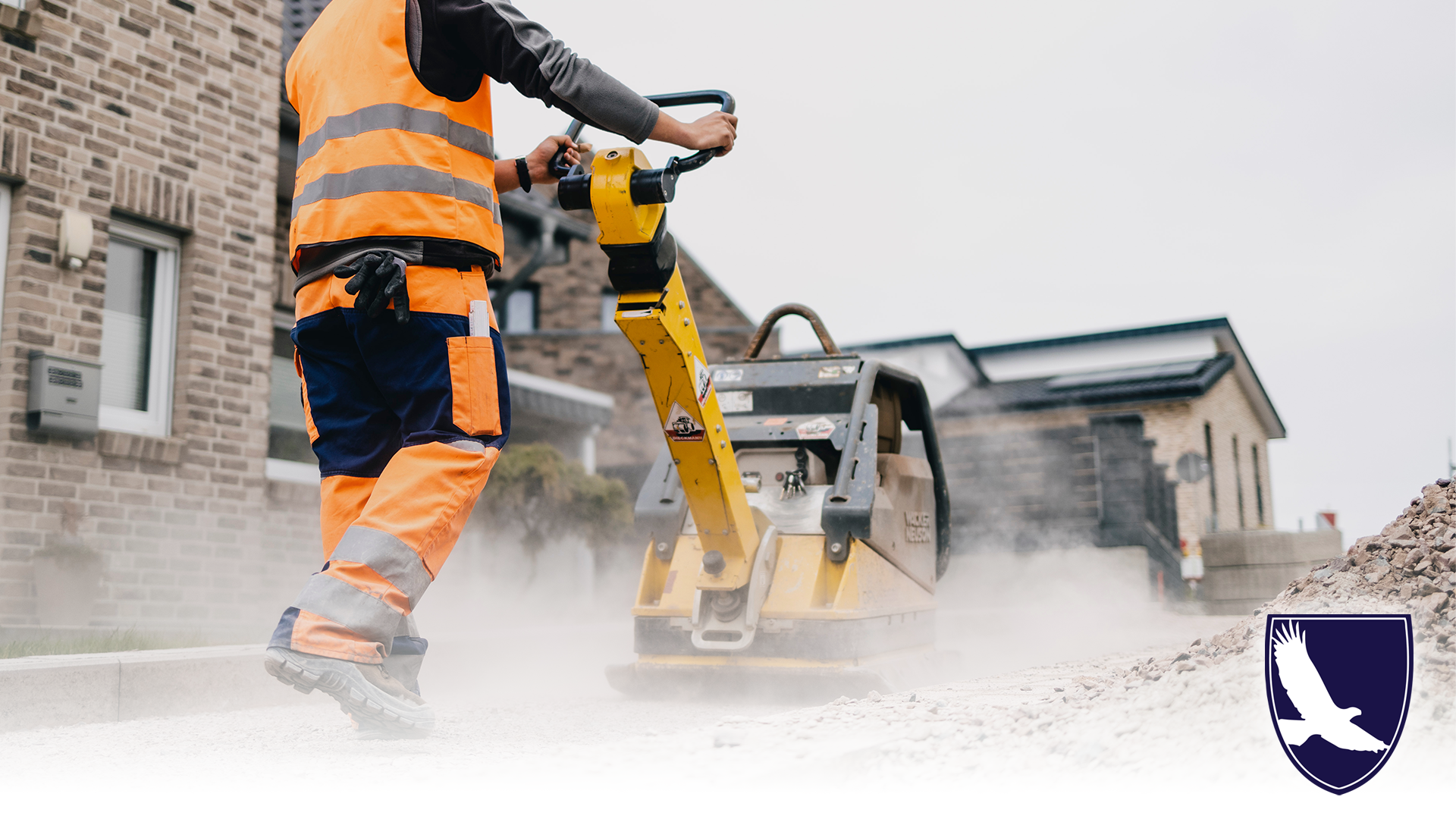 construction site man pushing concrete machine
